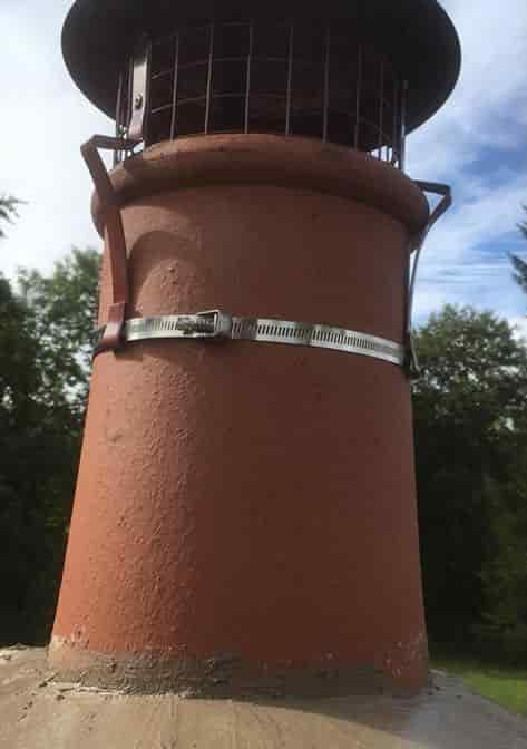 Chimney cowl fitted to prevent birds nesting
